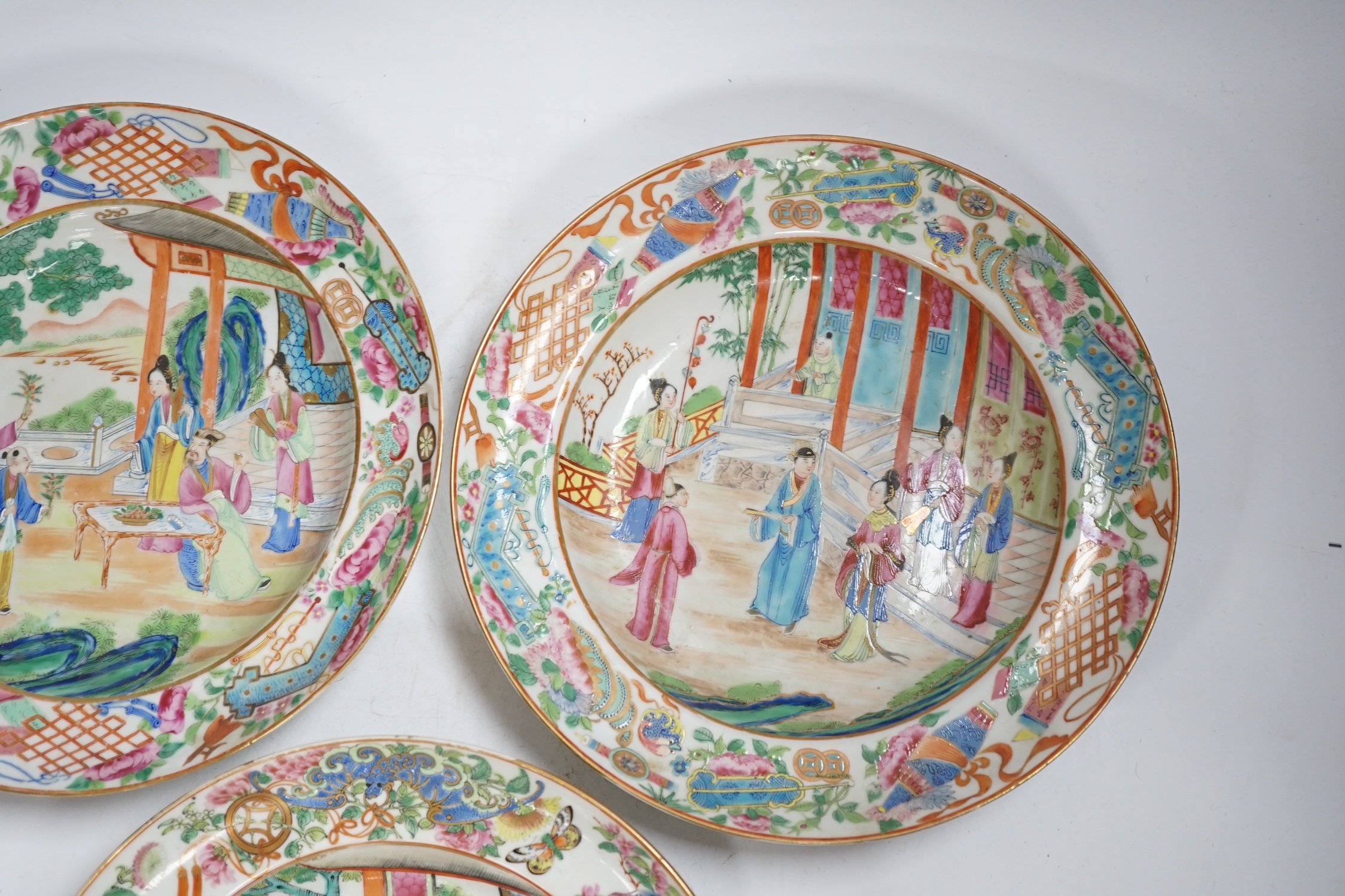 Three early 19th century Chinese famille rose soup plates, 25.5m diameter